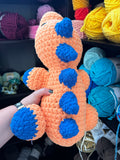 Sleeping Dinosaur Crochet Plushie - Melon/Blue