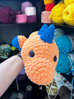 Sleeping Dinosaur Crochet Plushie - Melon/Blue