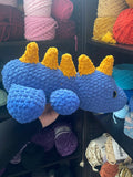 Sleeping Dinosaur Crochet Plushie - Blue/Gold